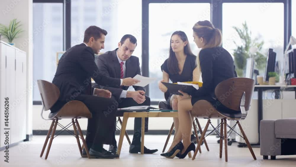 Corporate business group in a meeting in modern city office Corporate business group in a meeting in modern city office