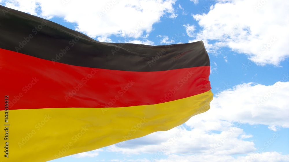 Waving flag of Germany on a blue cloudy sky. Waving flag of Germany on a blue cloudy sky.