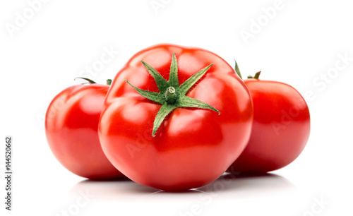 Fotografia organic tomatoes on white ..