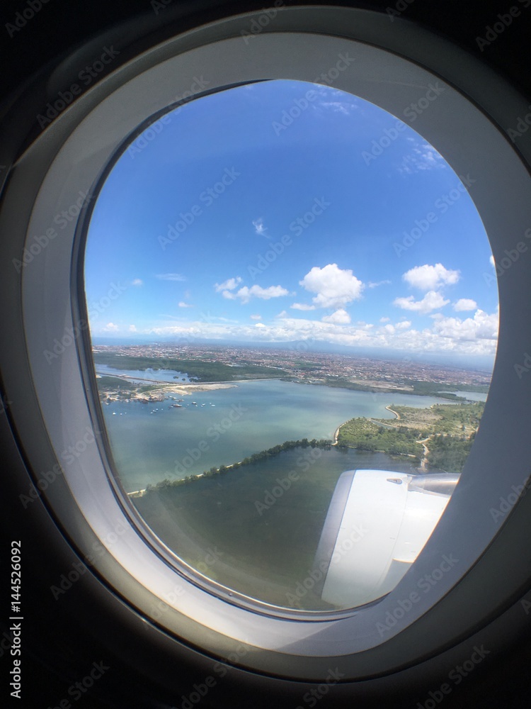 View of Bali through airplane window