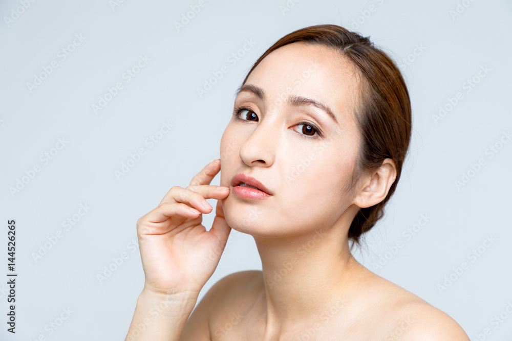 beauty woman who checks her skin, skin care, acne treatment beauty woman who checks her skin, skin care, acne treatment