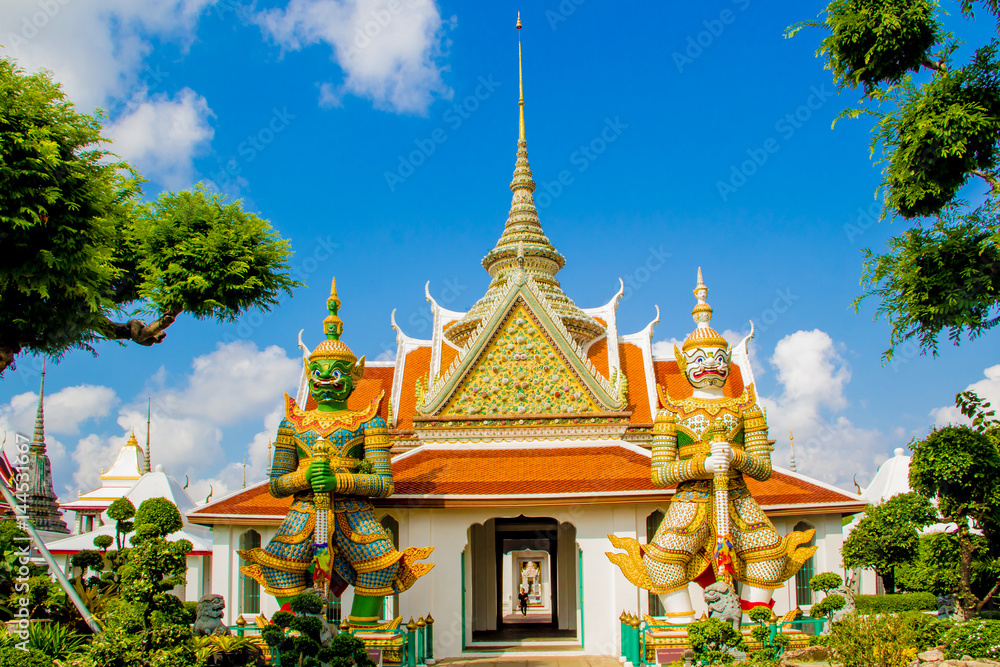 BANGKOK,THAILAND - MARCH 18,2017 : Wat Arun or Temple of the Dawn is one of a famous Buddhist temple in Bangkok, Thailand. BANGKOK,THAILAND - MARCH 18,2017 : Wat Arun or Temple of the Dawn is one of a famous Buddhist temple in Bangkok, Thailand.