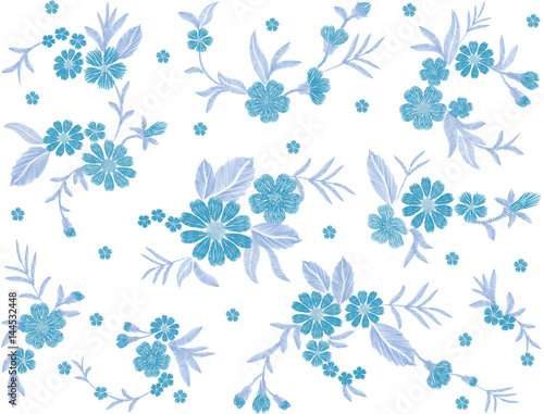 Blue embroidered flower seamless pattern field fashion patch fabric ornament traditional ethnic vintage embroidery vector illustration
