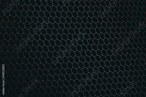 abstract texture honeycomb. Metallic net background or texture. metal mesh. full frame colourful illuminated detail of a metallic grid in front of a loudspeaker