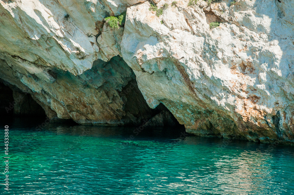 Greece, Zakynthos, August 2016. Head, face of Poseidon in the rock