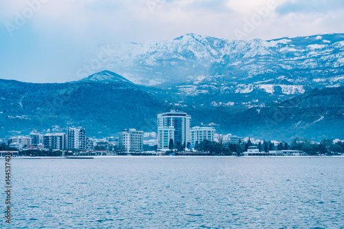 Snow-covered mountains of Budva in Montenegro, Adriatic sea © Nadtochiy