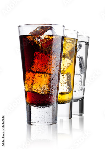 Glasses of energy drink cola and  sparkling water photo