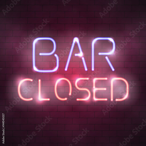 Bar closed neon sign on the brick wall
