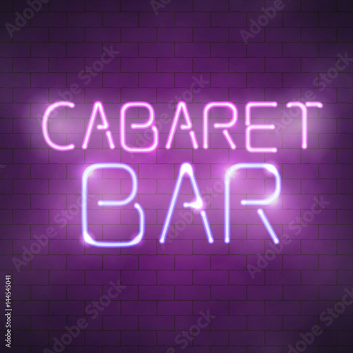 Cabaret bar neon sign on the brick wall