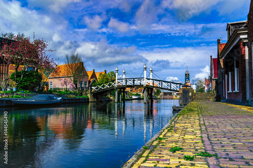Historic wooden bridge in Hindeloopen. The Netherlands photo