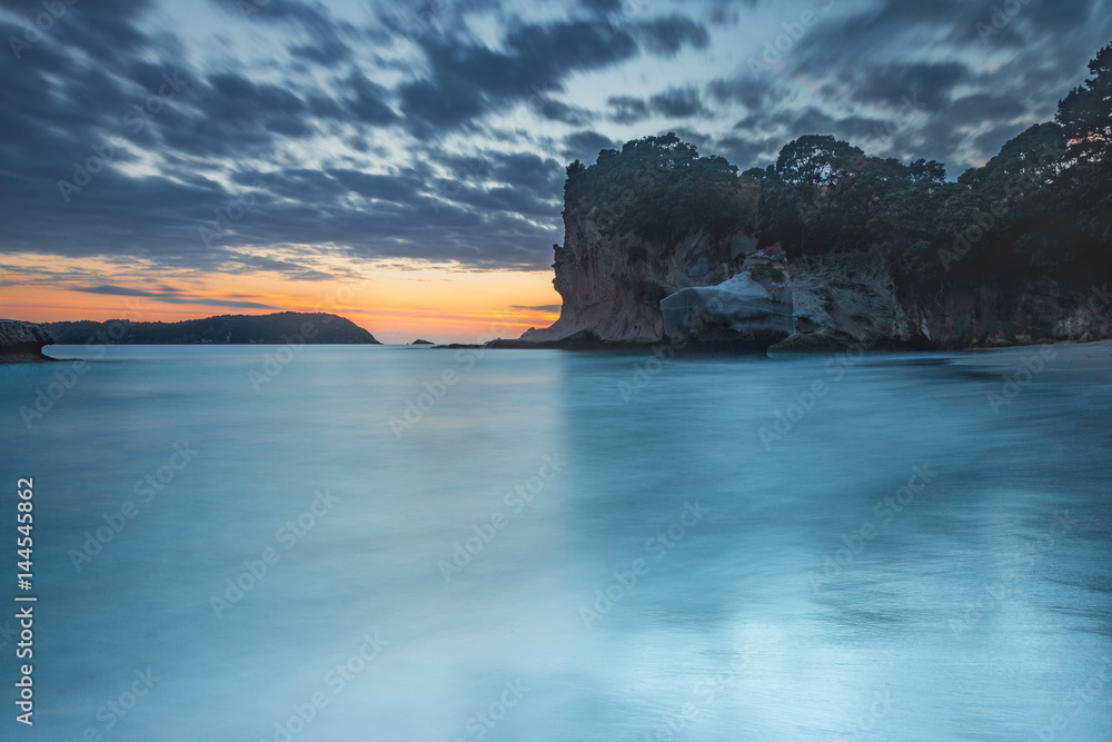 Long exposure of sunrise at Cathedral Cove, Coromandel, New Zealand