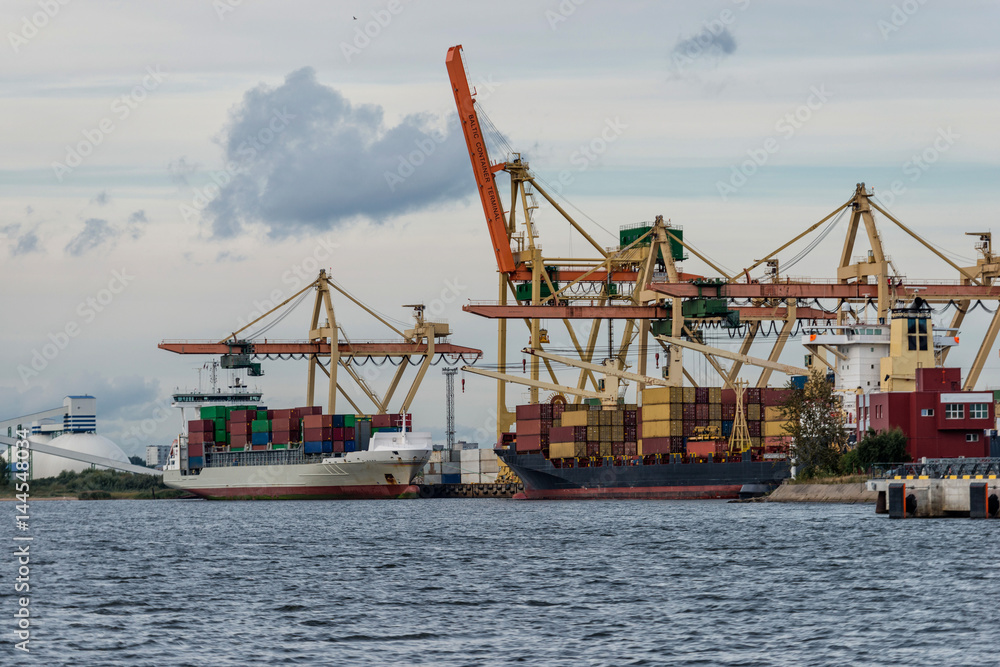 Container transshipment at port.