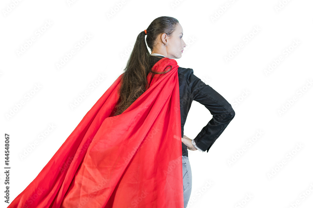 triumphantly beautiful young woman business leader is dressed in Superman's Cape on a white background
