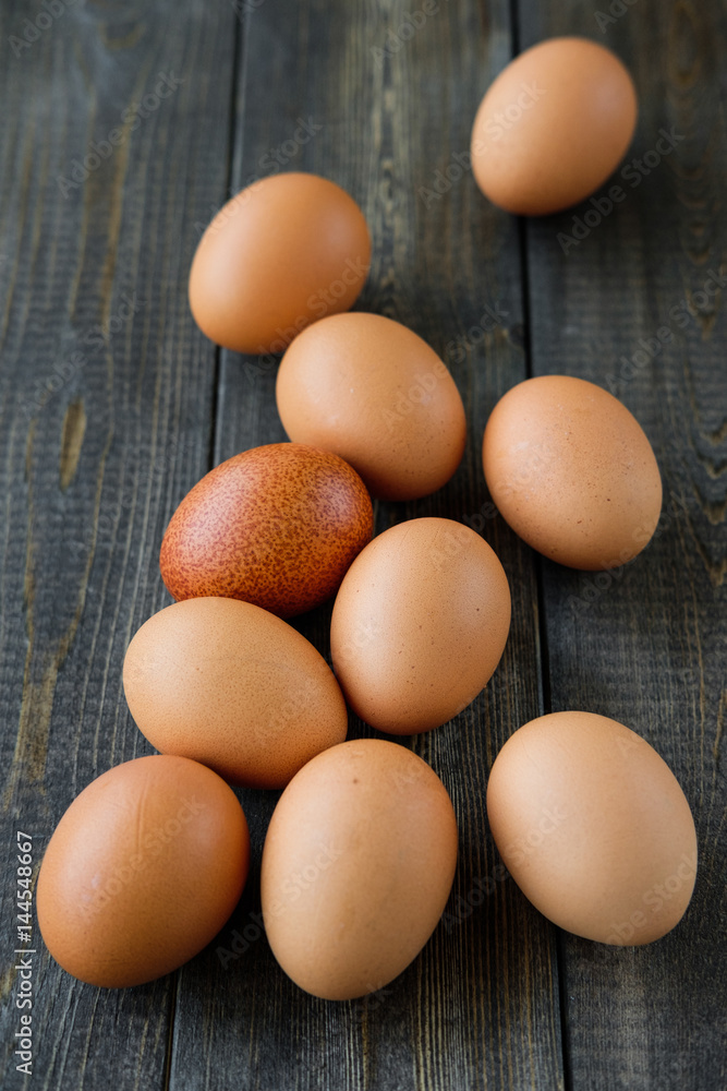 chicken eggs on wooden background