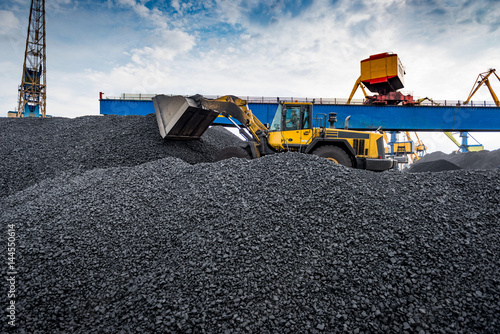 Work in port coal transshipment terminal. photo