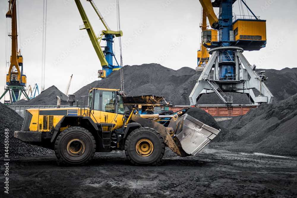 Work in port coal handling terminal.