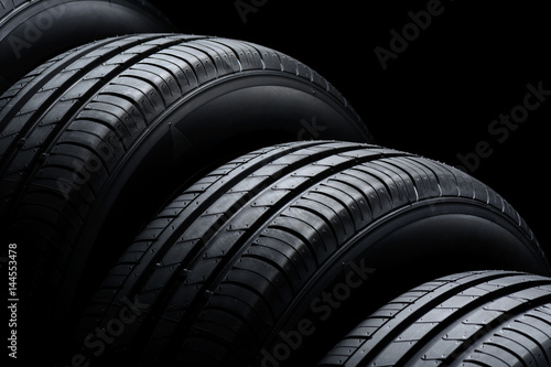 Car tires on black background