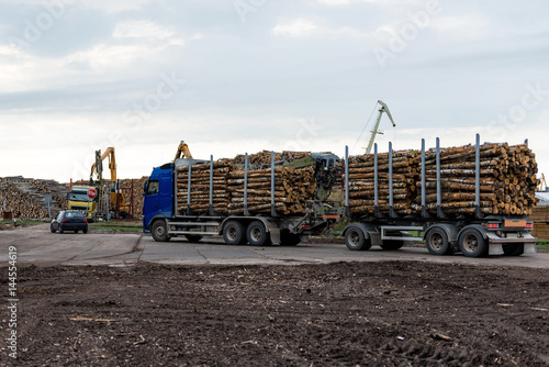 Log truck waiting list for unloading.