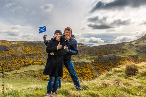 Couple on Arthur's seat in Edinburgh, Scotland photo