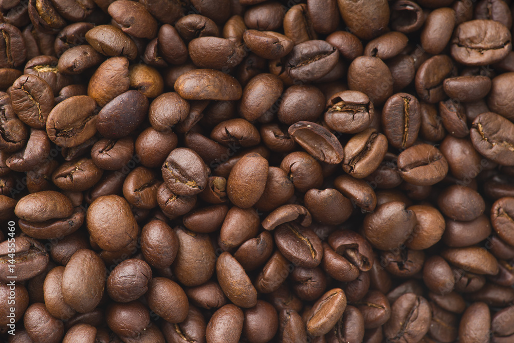 Roasted coffee beans.Top view close up shoot Roasted coffee beans.Top view close up shoot