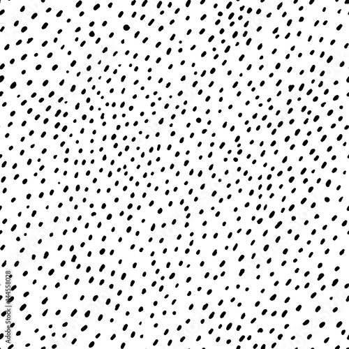 Vector seamless pattern. Hand drawn spots texture. Simple structure. Abstract background with many scattered pieces. Black and white design. Cute illustration for wallpaper, wrapping paper, textile.