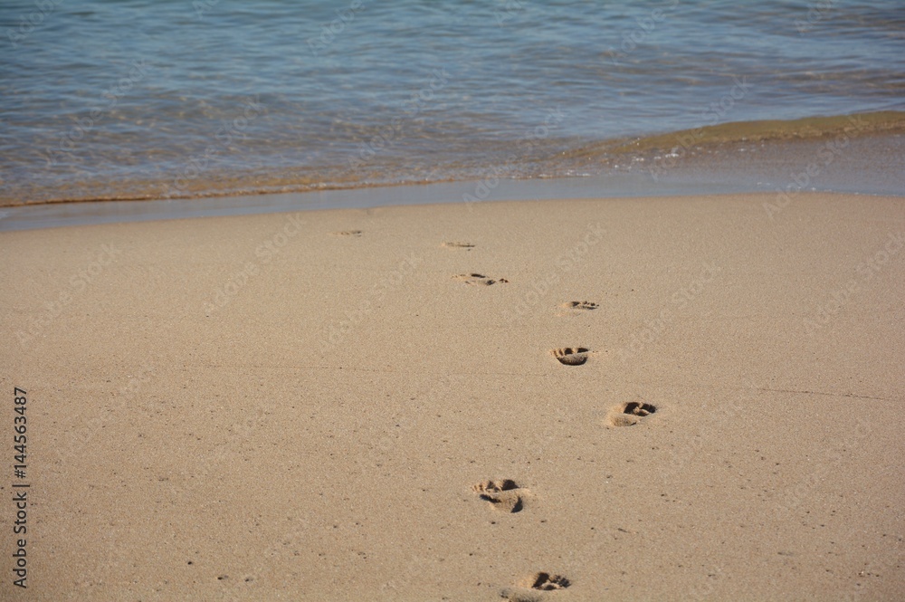 Pegadas na areia Pegadas na areia
