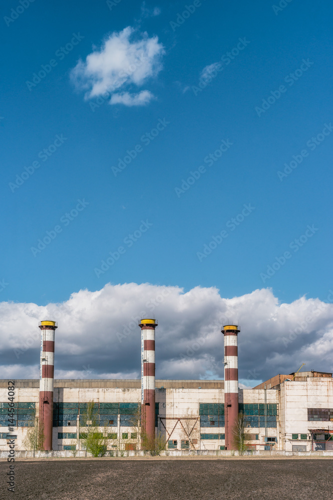 Industrial buildings in the sunny day with cloud and blue sky Industrial buildings in the sunny day with cloud and blue sky
