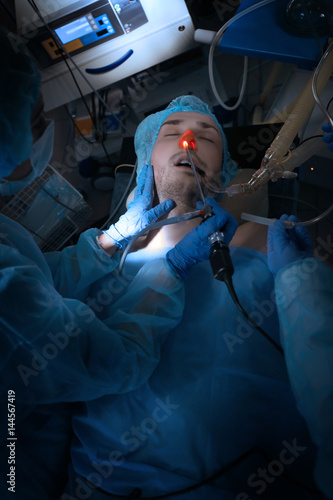 Operating of patient in mod...