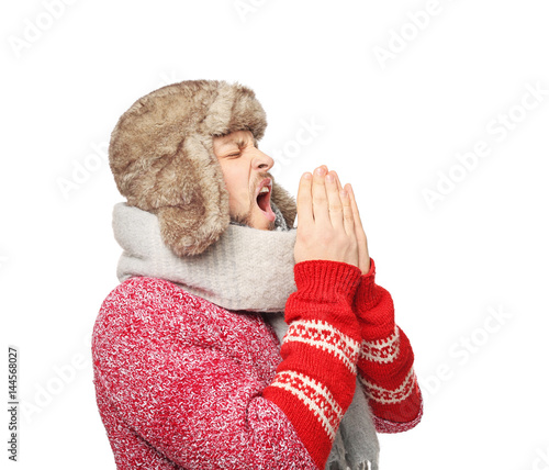 Young ill man on white back...