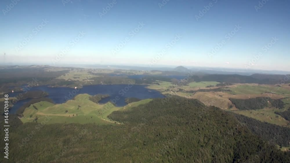 Forest in landscape of river and lake view from above in New Zealand. Travel and tourism in the world of wildlife. Forest in landscape of river and lake view from above in New Zealand. Travel and tourism in the world of wildlife.