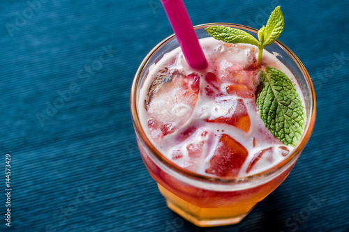 Photography Mai Tai Cocktail with mint leaves and ice.