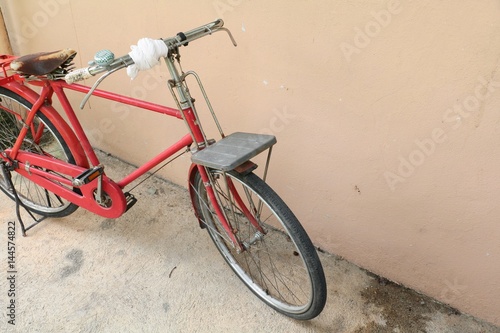 bicycle red classic vintage in former  with copy space for add text