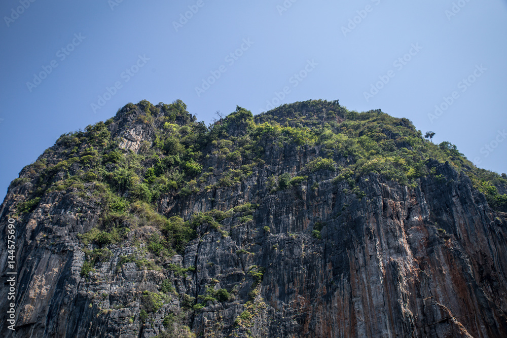 Cliff and the clear sea Phi Phi islands south of Thailand.