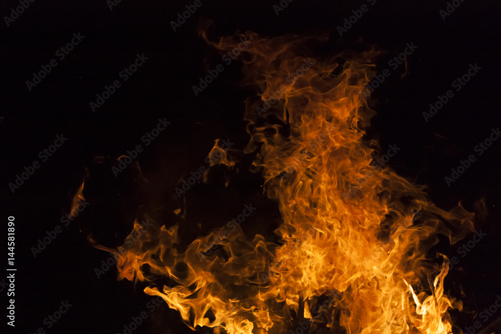 Obraz premium Yellow and orange fire frames isolated on a black background
