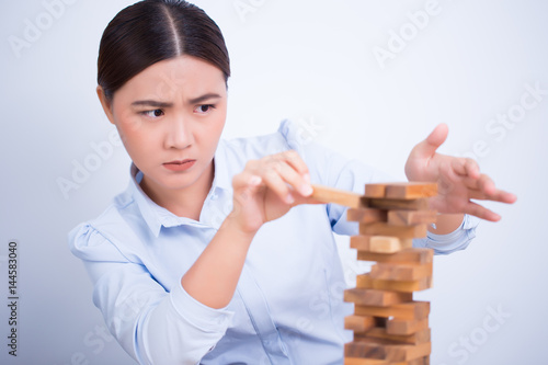 Woman be careful to build a tower puzzle
