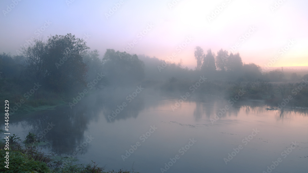 Foggy autumn landscape with forest river Foggy autumn landscape with forest river