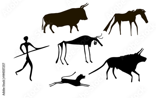 Primitive image of animals and man like images on walls of caves