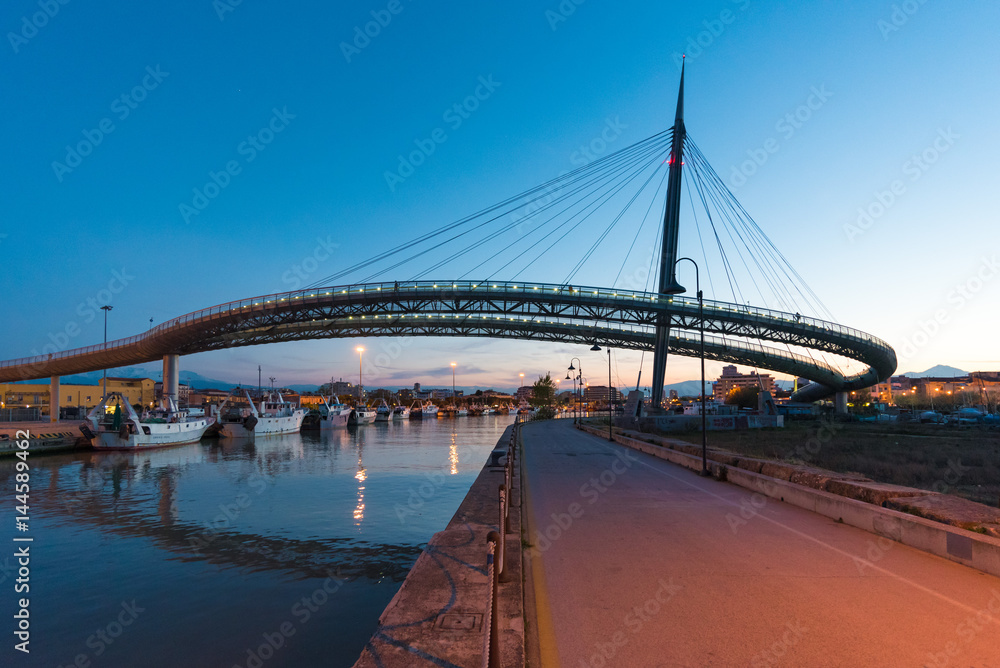 Pescara, Italy - The Ponte del Mare bridge at the dusk, in the canal and port of Pescara city, Abruzzo region