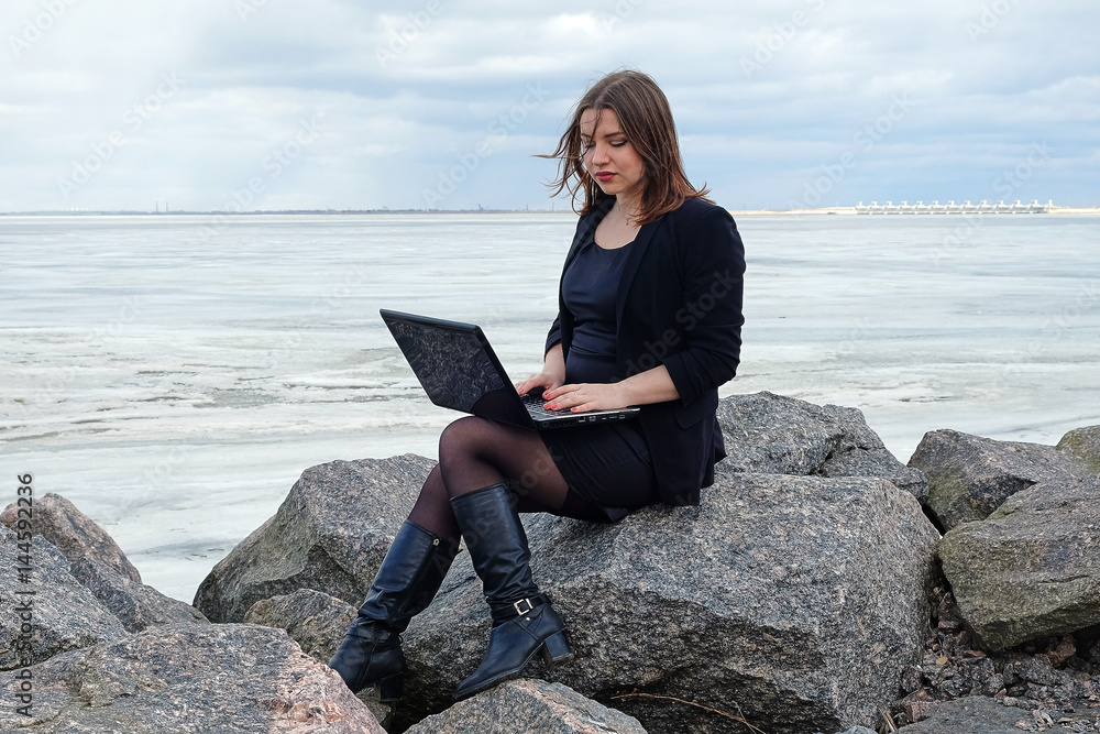 young girl on background of a winter sea