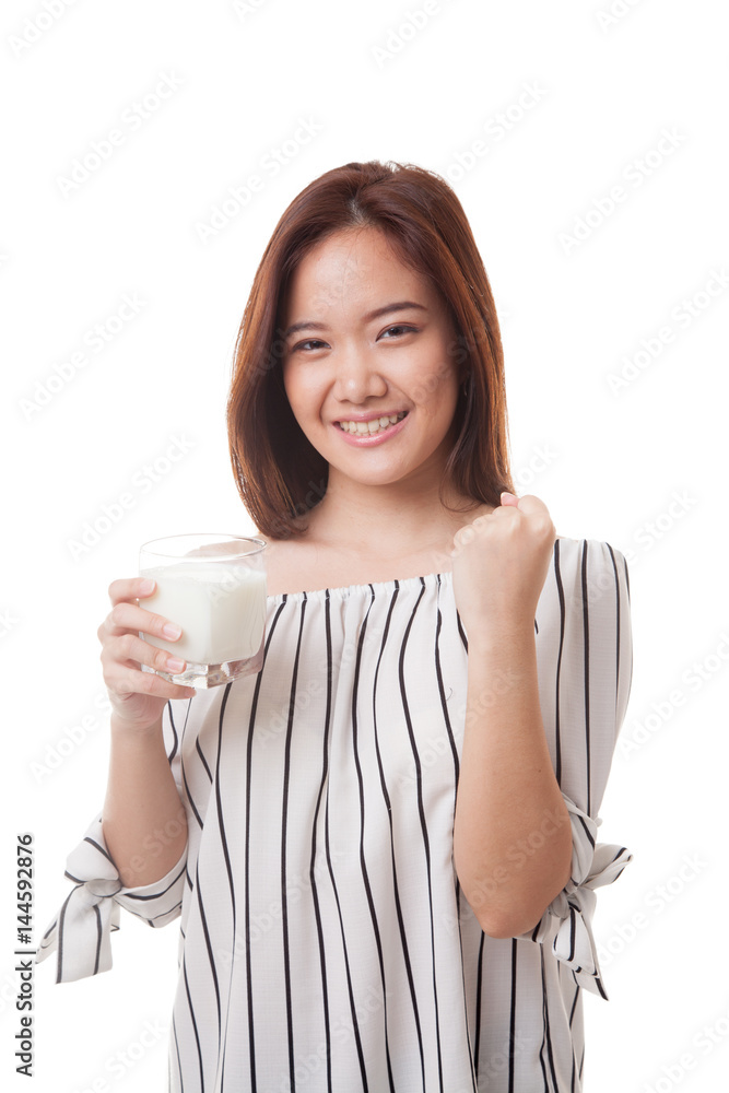 Healthy Asian woman drinking a glass of milk. Healthy Asian woman drinking a glass of milk.