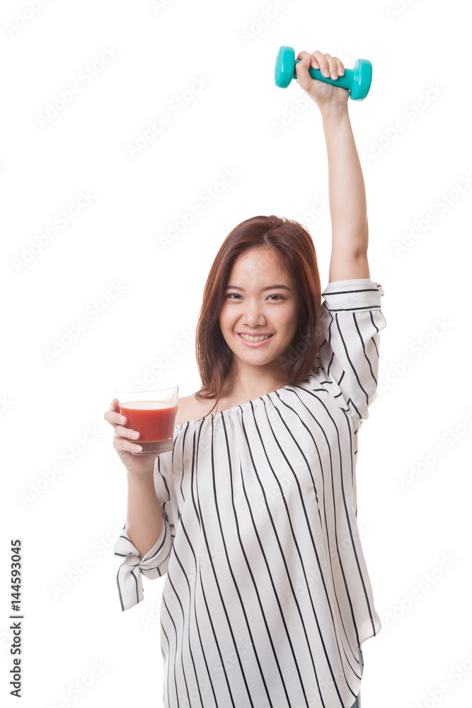 Healthy Asian woman with dumbbell and tomato juice. Healthy Asian woman with dumbbell and tomato juice.