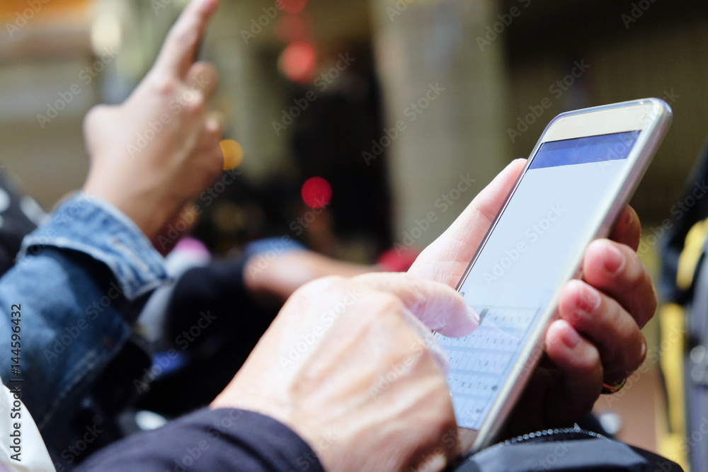 Group of people using mobile devices Group of people using mobile devices