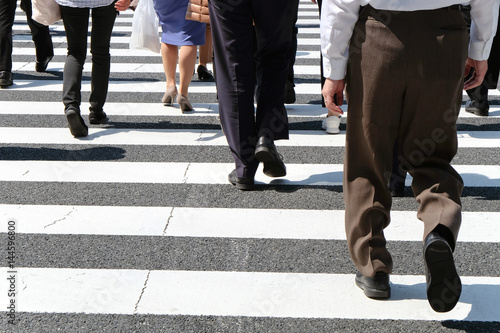 Pedestrians cross at Shibuya Crossing,Tokyo Japan © ponsulak