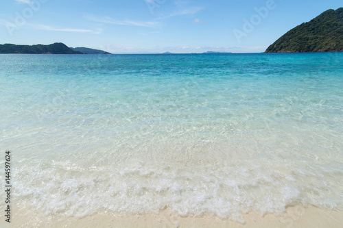 White sand beach and clear sea and calm sea on the sunshine days