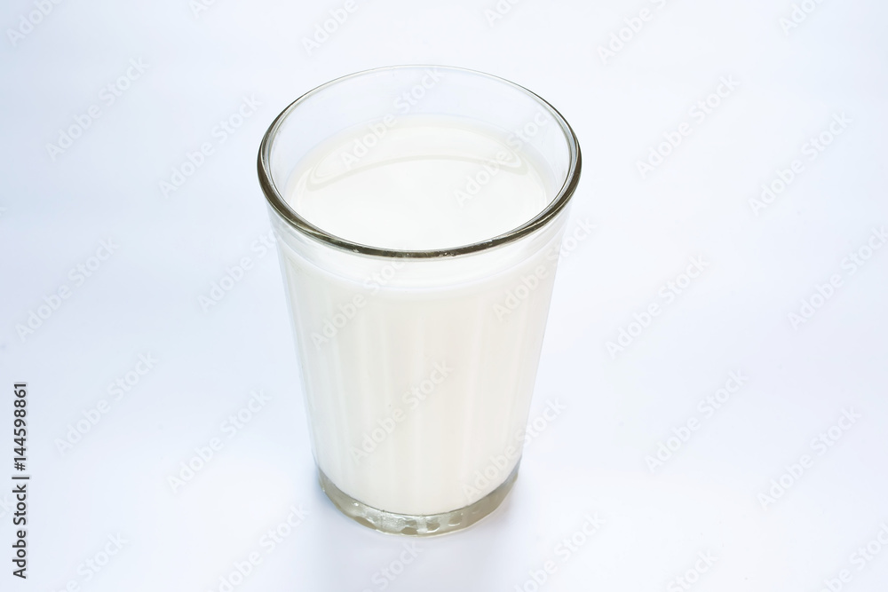 A glass of milk on white background isolated A glass of milk on white background isolated