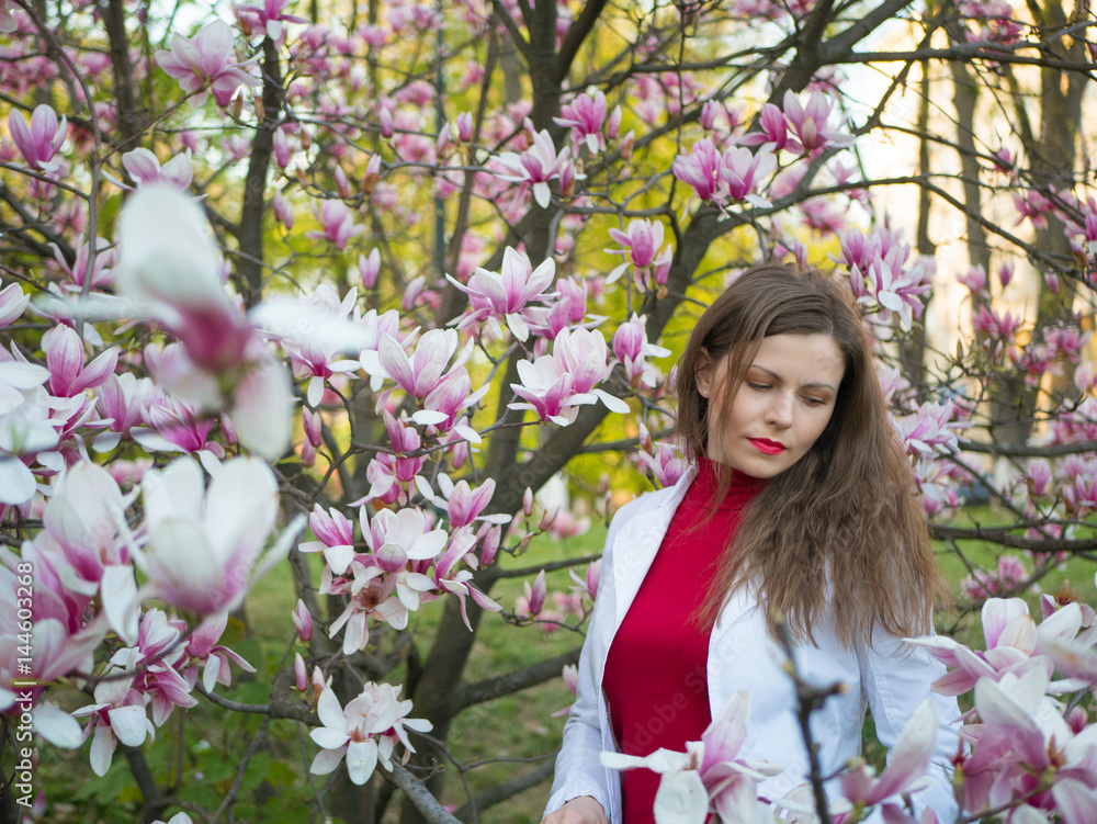 beautiful girl among magnolia pink blossom sping tree flowers beautiful girl among magnolia pink blossom sping tree flowers