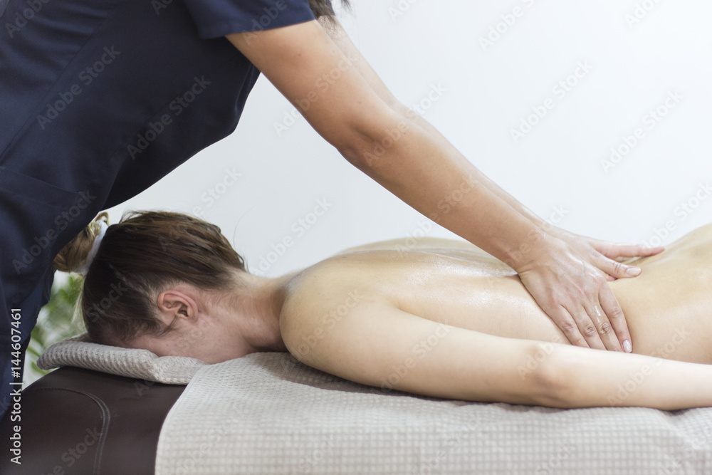 Fototapeta premium Woman having massage in the spa salon