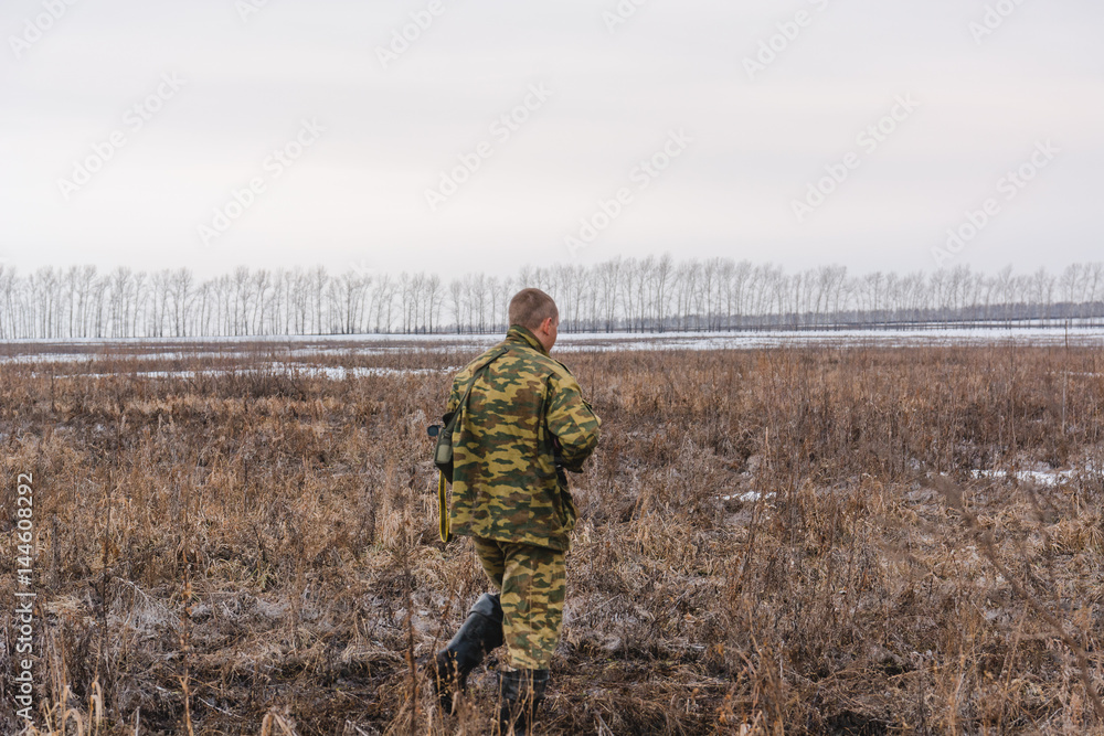 The hunter on hunting. The hunter looks out for a game. The hunter is stolen to production.