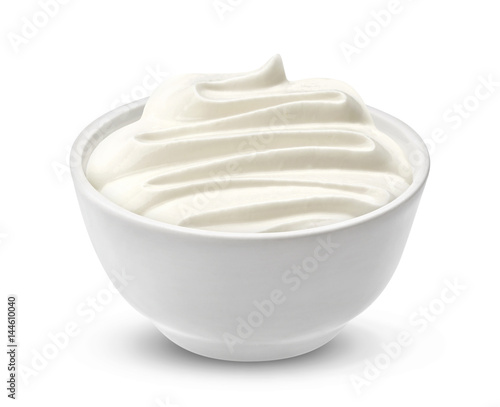 Sour cream in bowl isolated on white background, one of the collection of various sauces