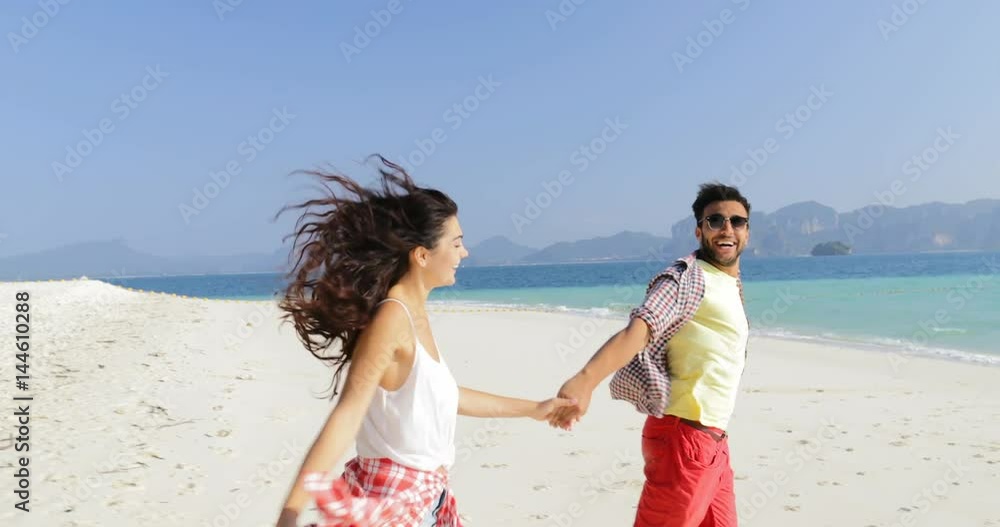 Couple Running, Turning Around Holding Hands On Beach, Happy Smiling Cheerful Man And Woman Slow Motion 60 Couple Running, Turning Around Holding Hands On Beach, Happy Smiling Cheerful Man And Woman Slow Motion 60